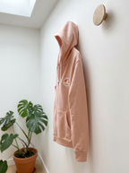 Sweat à capuche zippé rose pâle
